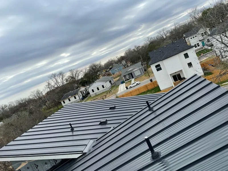 Standing seam metal roof panels with vents for Skylight Repair in Steger
